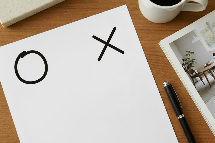○（まる）と×（バツ）が書かれた紙